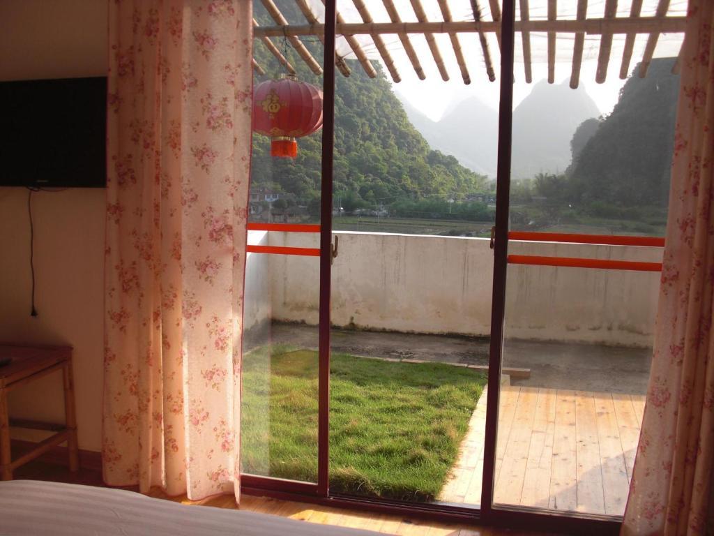 Huanggong Garden Hotel Yangshuo Chambre photo